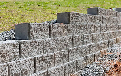 How Retaining Walls Improve Drainage and Prevent Water Damage 